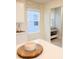 Bright kitchen with a window and built in storage at 10876 Waterwood Aly, Orlando, FL 32829