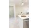 Kitchen island with breakfast bar seating, stainless steel appliances at 10876 Waterwood Aly, Orlando, FL 32829