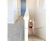 Upstairs hallway with view of downstairs and staircase at 10876 Waterwood Aly, Orlando, FL 32829