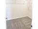 Spacious walk-in closet with wire shelving and neutral carpet at 10876 Waterwood Aly, Orlando, FL 32829