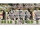 Directly above, showing the rooftops and parking lot of the townhome community at 1310 Seven Eagles Ct # 301, Reunion, FL 34747