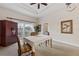 Dining room with view of balcony at 1310 Seven Eagles Ct # 301, Reunion, FL 34747