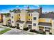 Luxury townhome community boasts elegant architecture and attractive landscaping at 1310 Seven Eagles Ct # 301, Reunion, FL 34747