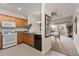 Open concept kitchen with granite counters at 1310 Seven Eagles Ct # 301, Reunion, FL 34747