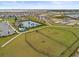 Aerial view of community amenities including pool, playground, and dog park at 1365 Hanoverian Dr, Lake Alfred, FL 33850