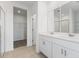Double vanity bathroom with a large walk-in shower at 1365 Hanoverian Dr, Lake Alfred, FL 33850