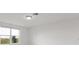 Spacious bedroom with a large window and neutral decor at 1365 Hanoverian Dr, Lake Alfred, FL 33850
