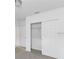 Bedroom with double door closet and neutral decor at 1365 Hanoverian Dr, Lake Alfred, FL 33850