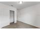 Bright bedroom with double-door closet and neutral walls at 1365 Hanoverian Dr, Lake Alfred, FL 33850