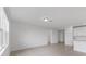 Spacious living room with tile floors and access to the kitchen at 1365 Hanoverian Dr, Lake Alfred, FL 33850