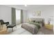 Relaxing main bedroom with comfy bed and sitting area at 1365 Hanoverian Dr, Lake Alfred, FL 33850
