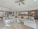 Spacious living room with sectional sofa and large windows at 1402 Lisbon Ct, Davenport, FL 33896
