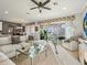 Bright living room with sectional sofa and access to patio at 1402 Lisbon Ct, Davenport, FL 33896