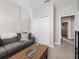 Cozy living space with comfy couch and coffee table at 1402 Lisbon Ct, Davenport, FL 33896