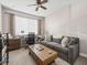 Home office with a desk, couch, and large window at 1402 Lisbon Ct, Davenport, FL 33896