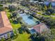 Aerial view of tennis court and community buildings at 1402 Lisbon Ct, Davenport, FL 33896