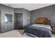 Spacious bedroom with dark-grey walls and a double bed at 142 Southern Pecan Cir # 207, Winter Garden, FL 34787