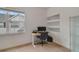 Home office with built-in shelving and a desk at 142 Southern Pecan Cir # 207, Winter Garden, FL 34787