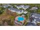 Community pool with surrounding patio and lounge area at 142 Southern Pecan Cir # 207, Winter Garden, FL 34787