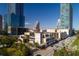 Aerial view of a building near skyscrapers and a city at 151 E Washington St # 520, Orlando, FL 32801