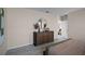 Bedroom with dresser and access to another room at 1672 Hummingbird Rd, Winter Haven, FL 33884