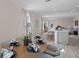 Open concept dining area with views into the kitchen and living room at 1672 Hummingbird Rd, Winter Haven, FL 33884