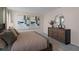 Bedroom with ensuite bathroom and large windows at 1680 Hummingbird Rd, Winter Haven, FL 33884
