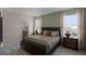 Main bedroom with ensuite bathroom and walk-in closet at 1680 Hummingbird Rd, Winter Haven, FL 33884