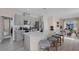 Modern kitchen with gray cabinets, quartz countertops, and stainless steel appliances at 1680 Hummingbird Rd, Winter Haven, FL 33884