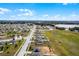 Aerial view shows home's placement within the neighborhood at 1952 Piedmont Ct, Mascotte, FL 34753