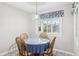 Charming breakfast nook with round table and blue tablecloth at 2367 Bagdad Ave, Orlando, FL 32833