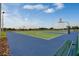 Full-size outdoor basketball court with benches at 2785 Flushing Dr, Apopka, FL 32703