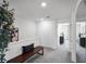 Upper hallway with bench and access to bedrooms at 2785 Flushing Dr, Apopka, FL 32703
