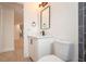 Clean bathroom with white vanity, gray tile, and modern fixtures at 2932 Carriage Dr, Daytona Beach, FL 32119