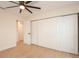 Spacious bedroom with double door closet and ceiling fan at 2932 Carriage Dr, Daytona Beach, FL 32119