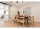 Dining room with mid-century modern table and chairs at 2932 Carriage Dr, Daytona Beach, FL 32119