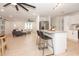 Modern kitchen features white cabinets, granite countertops and island at 2932 Carriage Dr, Daytona Beach, FL 32119