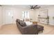 Bright living room with hardwood floors and stylish sectional sofa at 2932 Carriage Dr, Daytona Beach, FL 32119