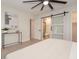 Main bedroom with ensuite bathroom and sliding barn door at 2932 Carriage Dr, Daytona Beach, FL 32119