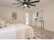 Main bedroom with large window, ceiling fan, and stylish decor at 2932 Carriage Dr, Daytona Beach, FL 32119