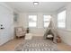 Cozy playroom with teepee, armchair, and patterned rug at 2932 Carriage Dr, Daytona Beach, FL 32119