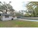 Large backyard with a pool and shed at 308 Wade Ave, Deland, FL 32724