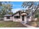 Charming single-story home with a newly renovated exterior and landscaping at 308 Wade Ave, Deland, FL 32724