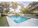 Inviting rectangular pool with a large backyard at 308 Wade Ave, Deland, FL 32724