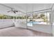 Spacious screened patio overlooking the pool area at 308 Wade Ave, Deland, FL 32724