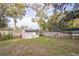 White shed in a spacious backyard setting at 308 Wade Ave, Deland, FL 32724