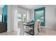 Dining area with sliding glass doors leading to the backyard at 316 Corso Loop, Winter Haven, FL 33884