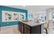Kitchen with granite countertops and dark brown cabinets at 316 Corso Loop, Winter Haven, FL 33884
