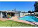 Private backyard with a sparkling pool and patio area at 326 Benton St, Orlando, FL 32839