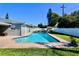 Spacious backyard with a refreshing pool and patio at 326 Benton St, Orlando, FL 32839